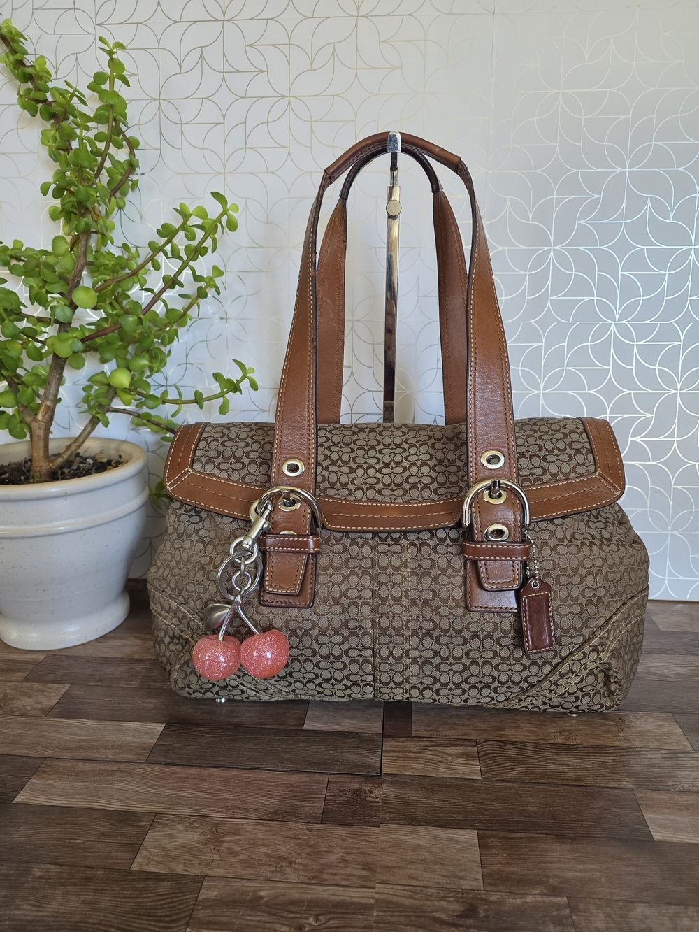 Vintage Coach Soho Signature Jacquard Flap Satchel, a classic design prominent